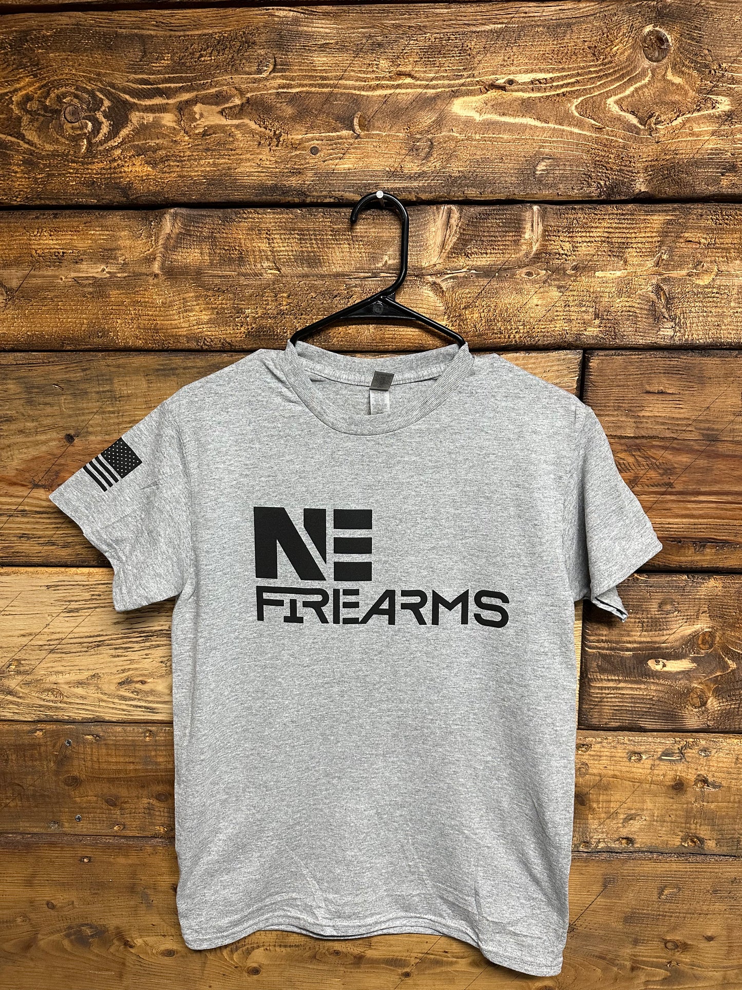 NE Firearms Grey T-Shirt with quote “I would rather die on my feet than live on my knees”