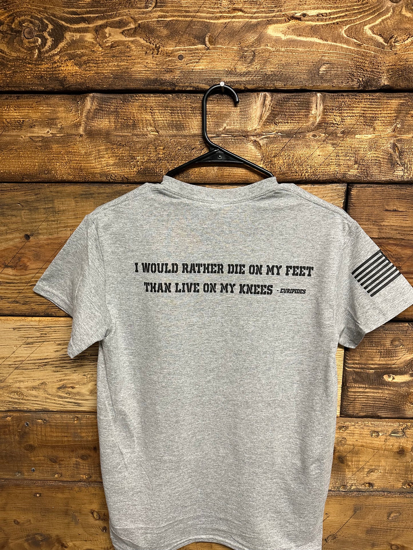 NE Firearms Grey T-Shirt with quote “I would rather die on my feet than live on my knees”